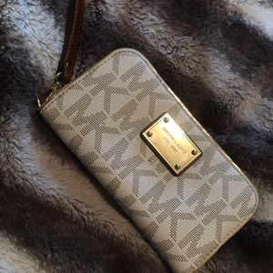 White Michael Kors wristlet wallet